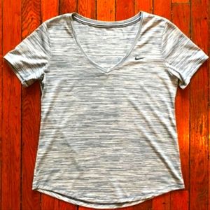 Women’s Nike Drifit Vneck light blue & white athletic shirt sleeve